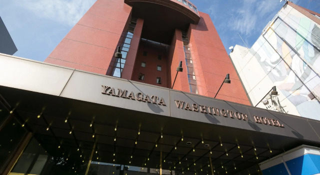 Кровать в общем номере Yamagata Nanokamachi Washington Hotel