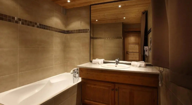Кровать в общем номере Chalet des Neiges