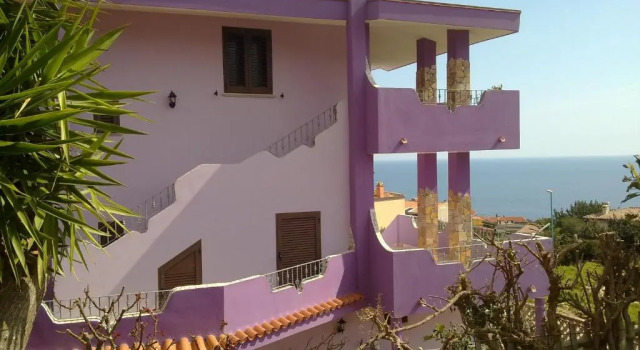Casa Purple, Забронировать Отель Кала-Гононе Залив Орозеи