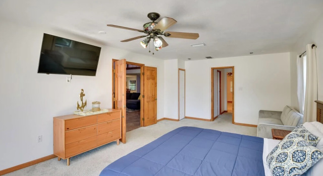 Lovely Palm Coast Retreat w/ Outdoor Kitchen, Забронировать Дом для отпуска Палм-Кост штат Флорида, рядом с Общинная церковь в Хэммоке