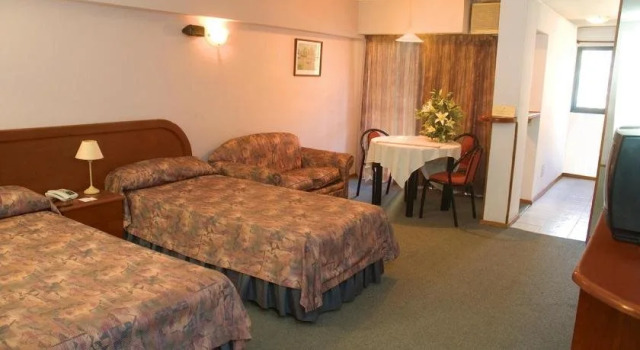 Pringles Apart Hotel, Забронировать Апарт-отель Апарт-отели Росарио, рядом с Rosario Central Athletic Club, Апарт-отель