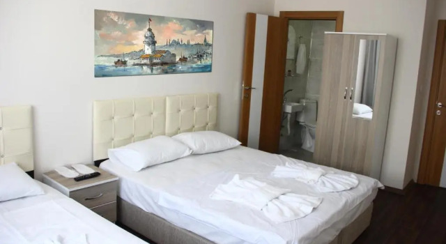 Трёхместный номер Marpalace Hotel