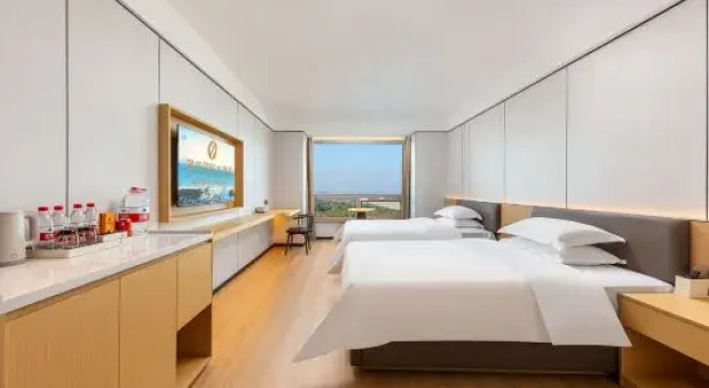 Семейный люкс с видом на море Yucheng Seaview International Hotel