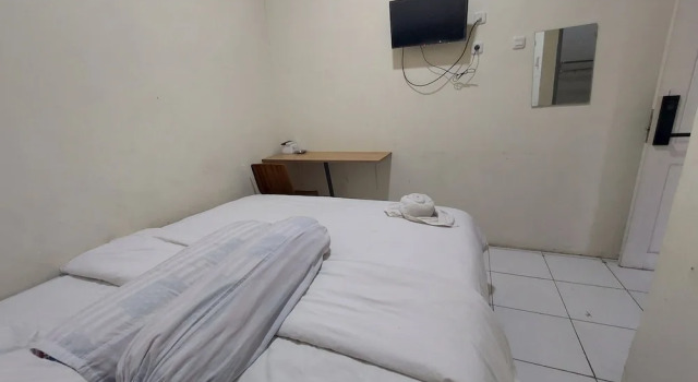 Hotel O Mahendra HomestayNearTaman Wisata Bukit Rurukan, Prenota Hotel Hotel a Sulawesi con parcheggio, Parcheggio