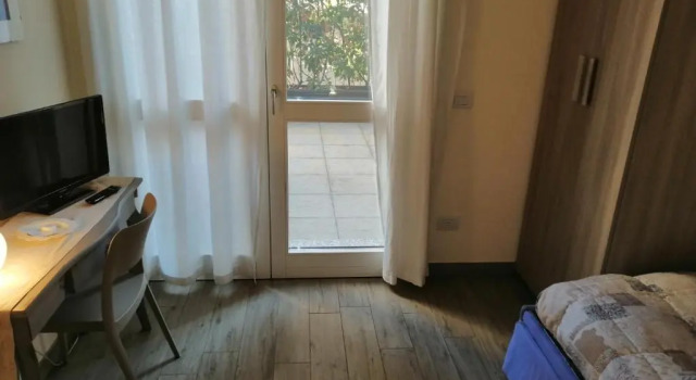 Номер Standard ampio appartamento con giardino e box