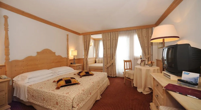 Hotel Grifone, Забронировать Отель Отели Livinallongo del Col di Lana 4 звезды, 4*