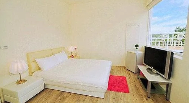 Q House
