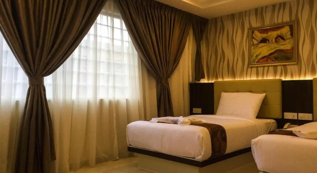 Luksusowy trzyosobowy pokój Louis Hotel