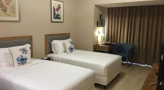 Шестиместный семейный люкс Deluxe Cherry Residences May-Fourth Square
