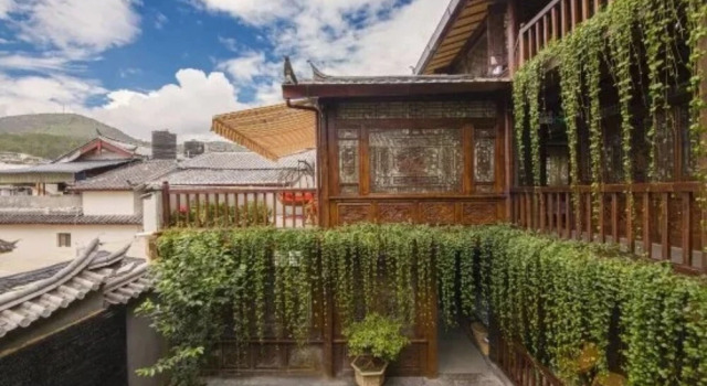 Lijiang Yupin Courtyard Inn, Забронировать Отель Лицзян Юньнань, рядом с Улица Сквер-стрит Древнего города Даянь