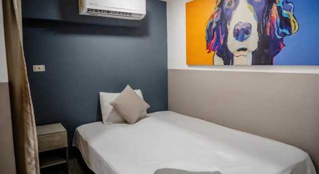 Четырёхместный номер Comfort Bahia 79 Apartasuites Cerca al Centro