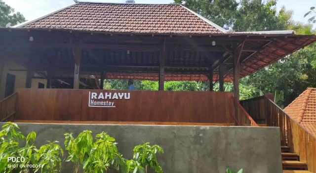 Кровать в общем номере Homestay Rahayu