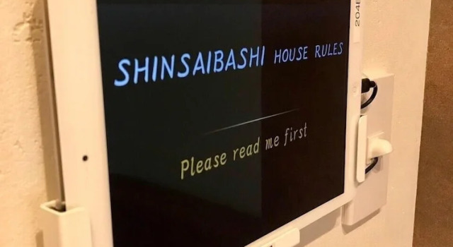 Кровать в общем номере WELLSTAY Osaka Shinsaibashi Apartment hotel