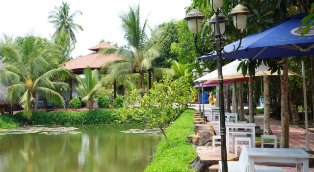 Кровать в общем номере Bao Gia Trang Vien - The Green resort