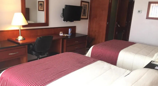Четырёхместный номер Executive Hotel Fortin Plaza