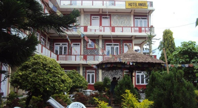 Кровать в общем номере Hotel Angel