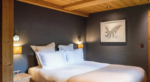 Кровать в общем номере с 6 комнатами LAlpaga, a Beaumier hotel