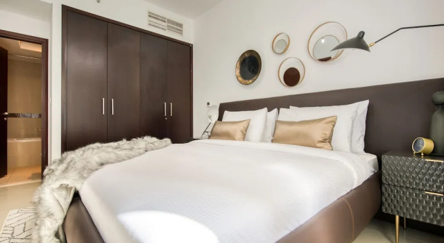 Maison Privee - Radiant Urban Retreat with Iconic Burj Khalifa Vws, Забронировать Дом для отпуска Коттеджи Эмирата Дубая, рядом с Дубайский аквариум, Коттедж