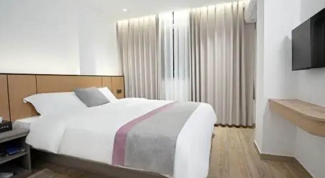 Трёхместный семейный люкс Deluxe с 2 комнатами Hanyu Boutique Stay (Gucheng)