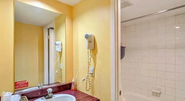 Четырёхместный номер Comfort Цокольный этаж Motel des Pentes et Suites