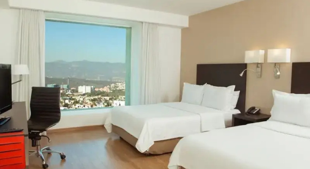 Четырёхместный номер Executive Fiesta Inn Periferico Sur