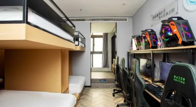 Кровать в общем номере WanYoo Esports Hotel (Shanghai Songjiang Wanda)