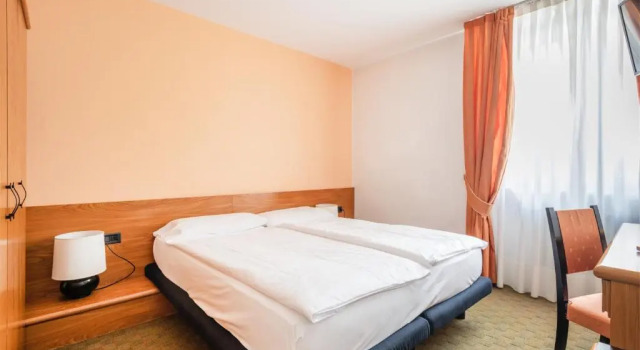 Четырёхместный номер Economy Hotel Alpina