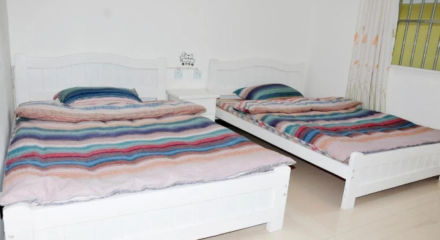 In the Spring International Youth Hostel, Prenota Ostello Dehong Yunnan
