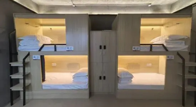 Кровать в общем номере (женский номер) Xingsu Youth Hostel (Hongshan Mall Branch of Municipal Traditional Chinese Medicine Hospital)
