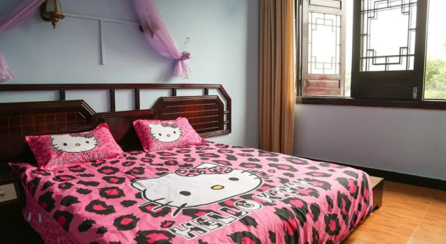 Yangshuo Qiqi Guesthouse, Prenota Hotel Yangshuo Guangxi