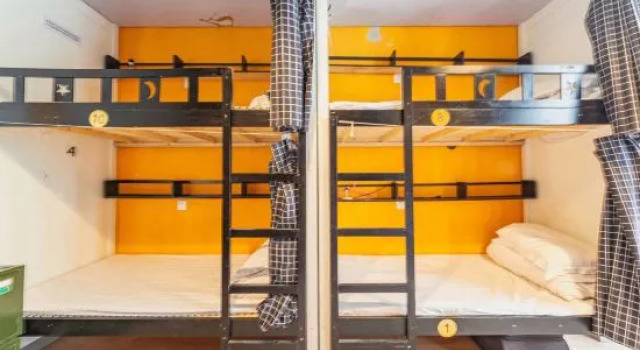 Кровать в общем номере Shanghai Yuyuehai Youth Hostel（Shanghai railway station)
