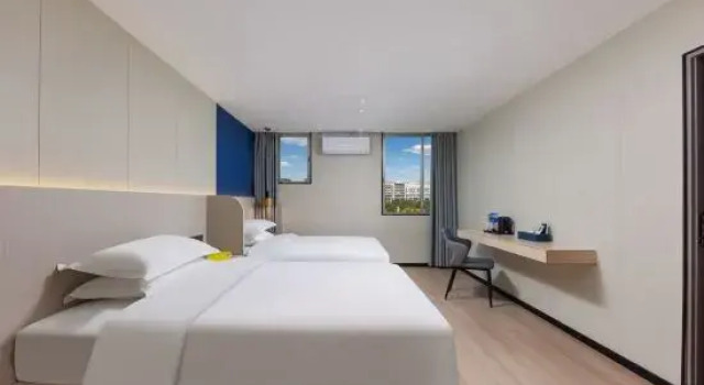 Люкс Executive Junting International Apartment (Zhanjiang High-Speed Railway North Station Dingsheng Square)