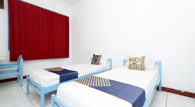 Camera Economy Hotel O Saudara