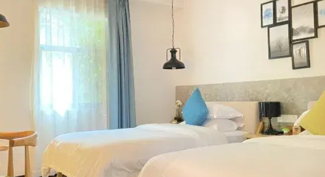 Hua Qian Zhu Homestay, Prenota Hotel Bamei Yunnan