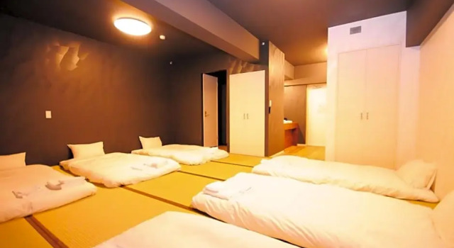 Кровать в общем номере (мужской номер) Hotel Japanesque Fukuoka