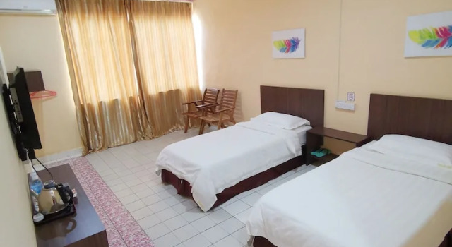 Номер Economy Indah Inn
