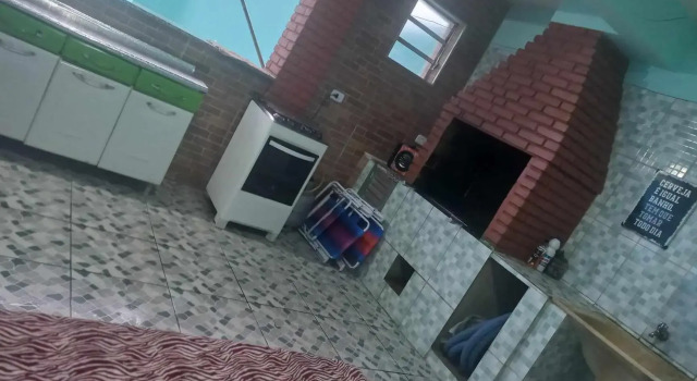 CASA DE PRAIA CARAGUA COM Piscina