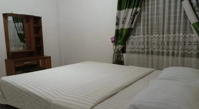 Номер Deluxe OYO 93706 Penginapan Syariah Hj. Kenan