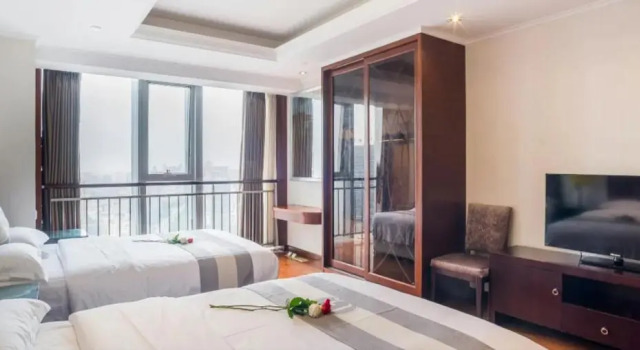 Двухместный номер Standard с видом на море Qingdao Jinshan We+ Holiday Apartment (Wusi Square)