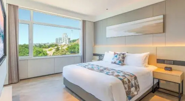 Люкс Deluxe с видом на море Jiulongwan International Hotel