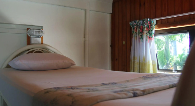 Кровать в общем номере Bamboo Backpackers