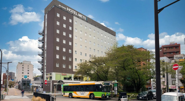 Кровать в общем номере JR-East Hotel Mets Komagome