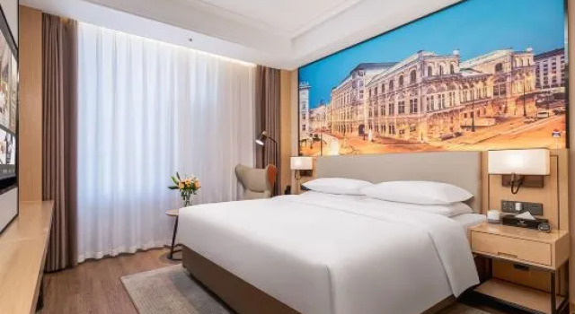 Люкс Deluxe Vienna International Hotel (Zhaotong Wuyue Plaza)