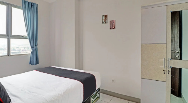 Camera Deluxe OYO Capital O 91631 M-square Apartement