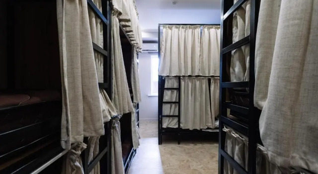 Postel ve společném pokoji pro ženy Hostel Doma
