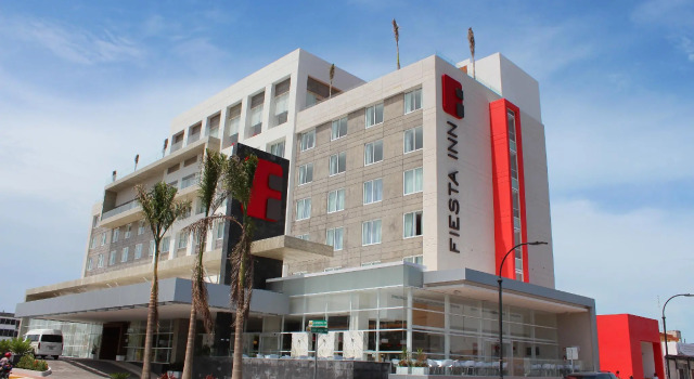 Кровать в общем номере Fiesta Inn Chetumal