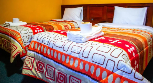 Кровать в общем номере Huaraz Center Hostal