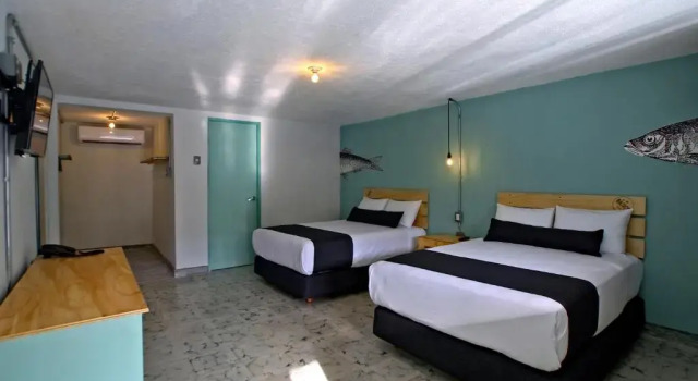 Четырёхместный номер Standard Mas Basico Hotel