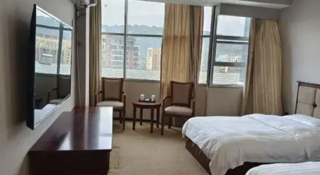 Guojiu Hotel, Забронировать Отель Энши Хубэй