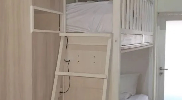 Кровать в общем номере Sky Hotel Jogja
